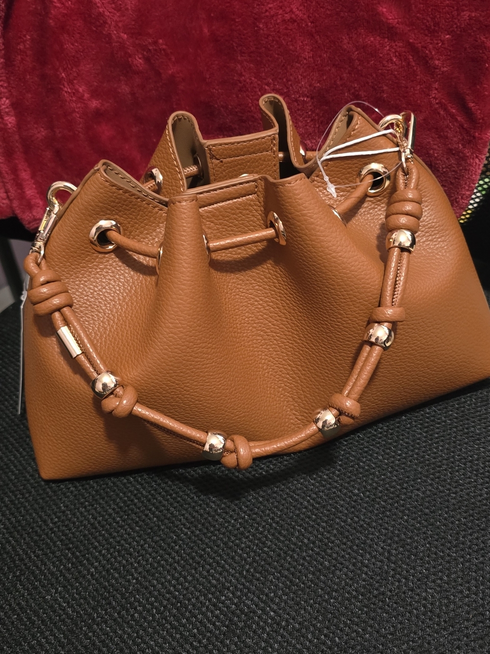 Women's Tan Drawstring Shoulder Bag with Gold Accents